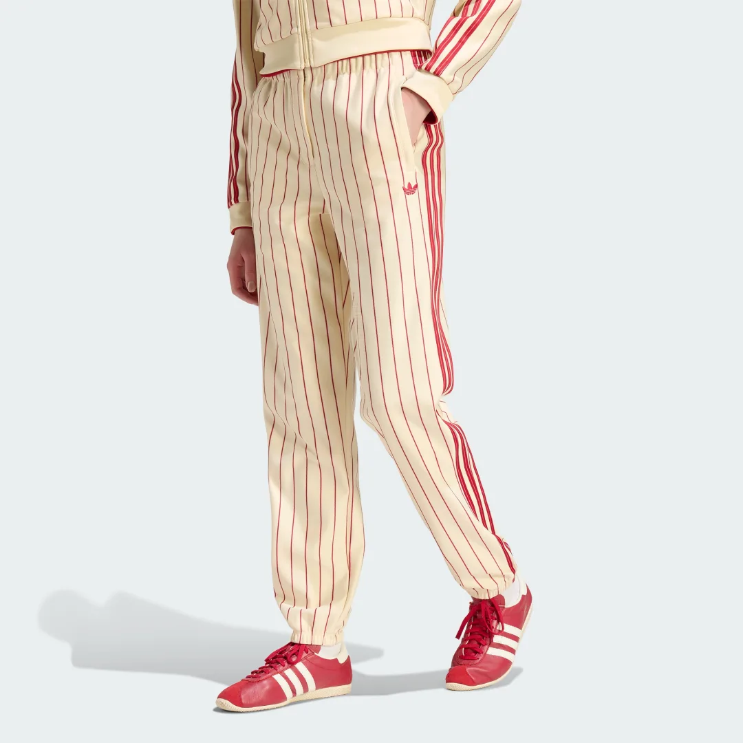 Detalle de Pantalón Firebird Pinstripe de Adidas – Amarillo