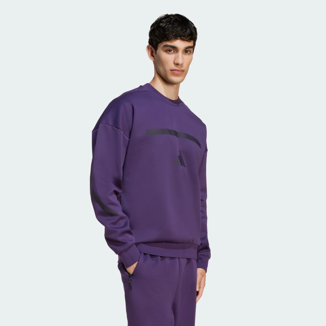 Detalle de Sudadera New adidas Z.N.E. (violeta) – comodidad y estilo urbano