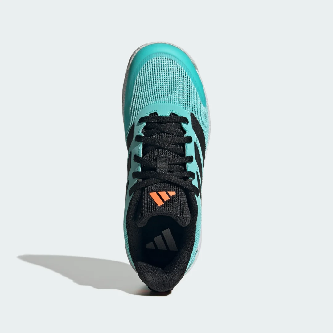 Detalle 2 de Zapatilla Ubersonic Tennis (Niños) de Adidas: comodidad y juego seguro en Turquesa