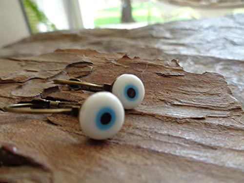 Detalle de Orecchini Evil Eye in bronzo con cabochon e perla - Asai Bolivien Ethno Tribal