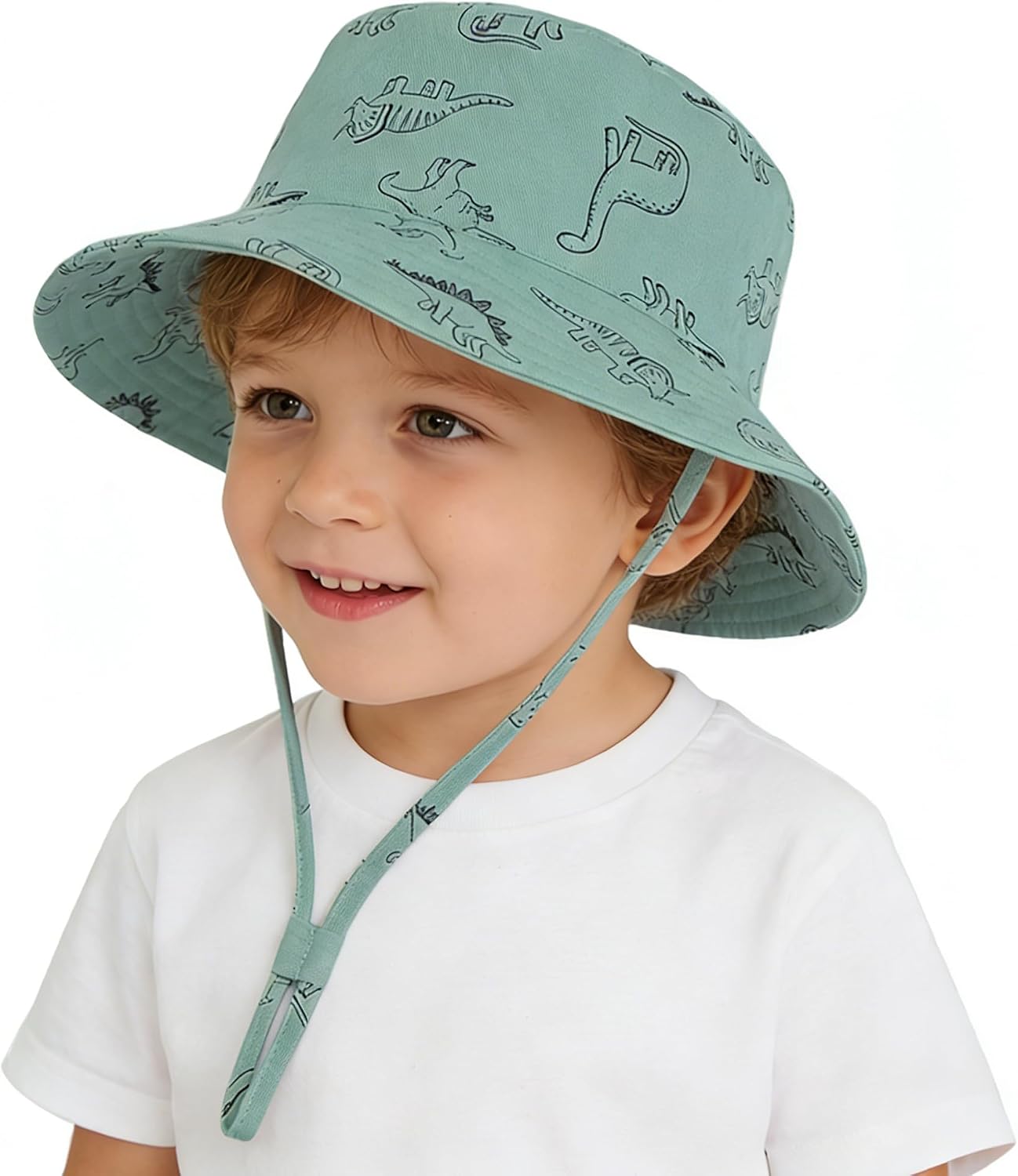 Detalle de YMYDYFC UPF 50+ baby sun hat with adjustable chin strap and dinosaur bucket design
