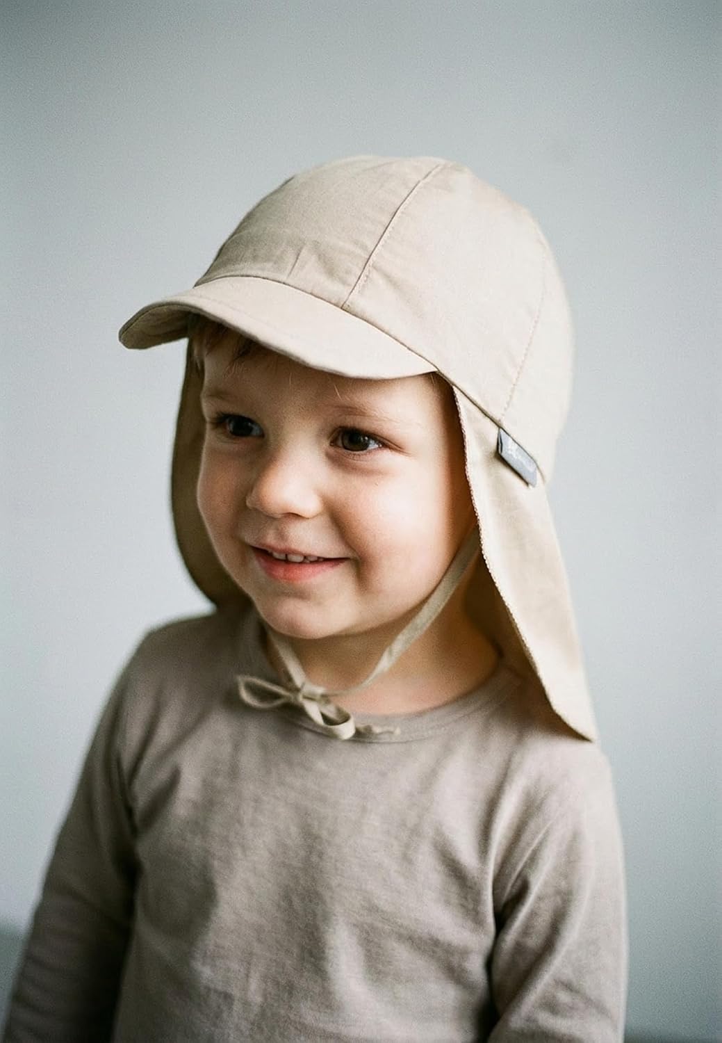 Detalle de Sterntaler Schirmmütze Nacken Basic – Unisex Baby/Kinderhut mit Nackenschutz, Ohrenklappen und UV-Schutz 50+, eisgrün