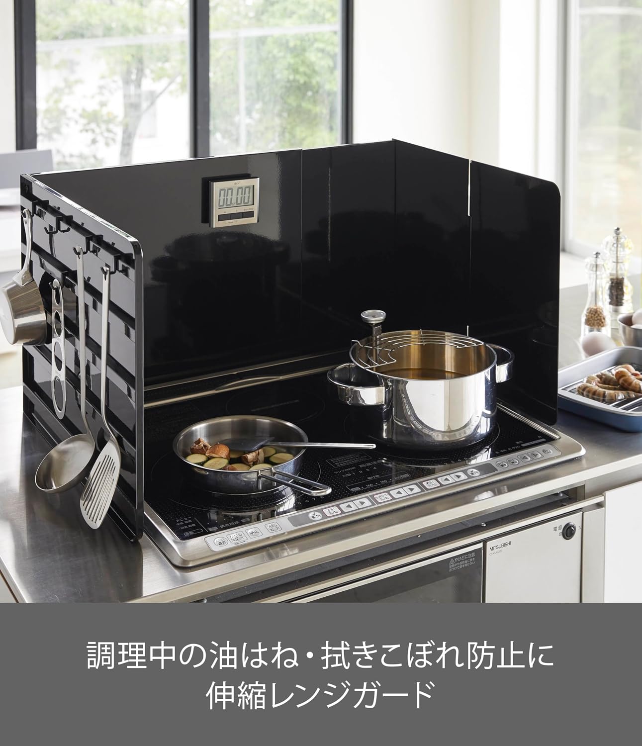 Detalle de 山崎実業 tower 4975 伸縮レンジガード ブラック 幅47~80cm・折り畳みパネル付き