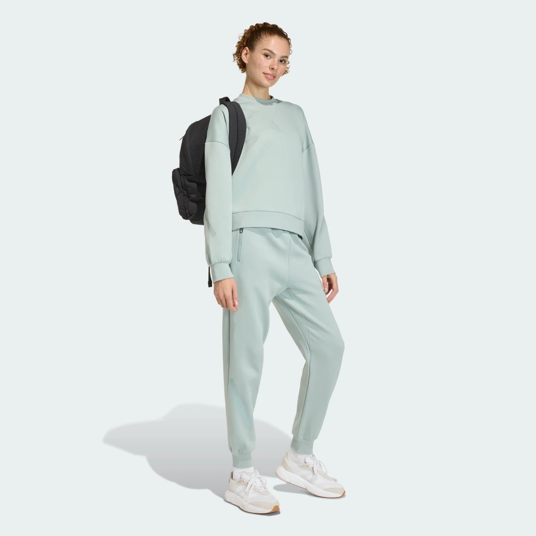 Detalle de SUDADERA ADIDAS Z.N.E. Verde — confort y estilo urbano de Adidas