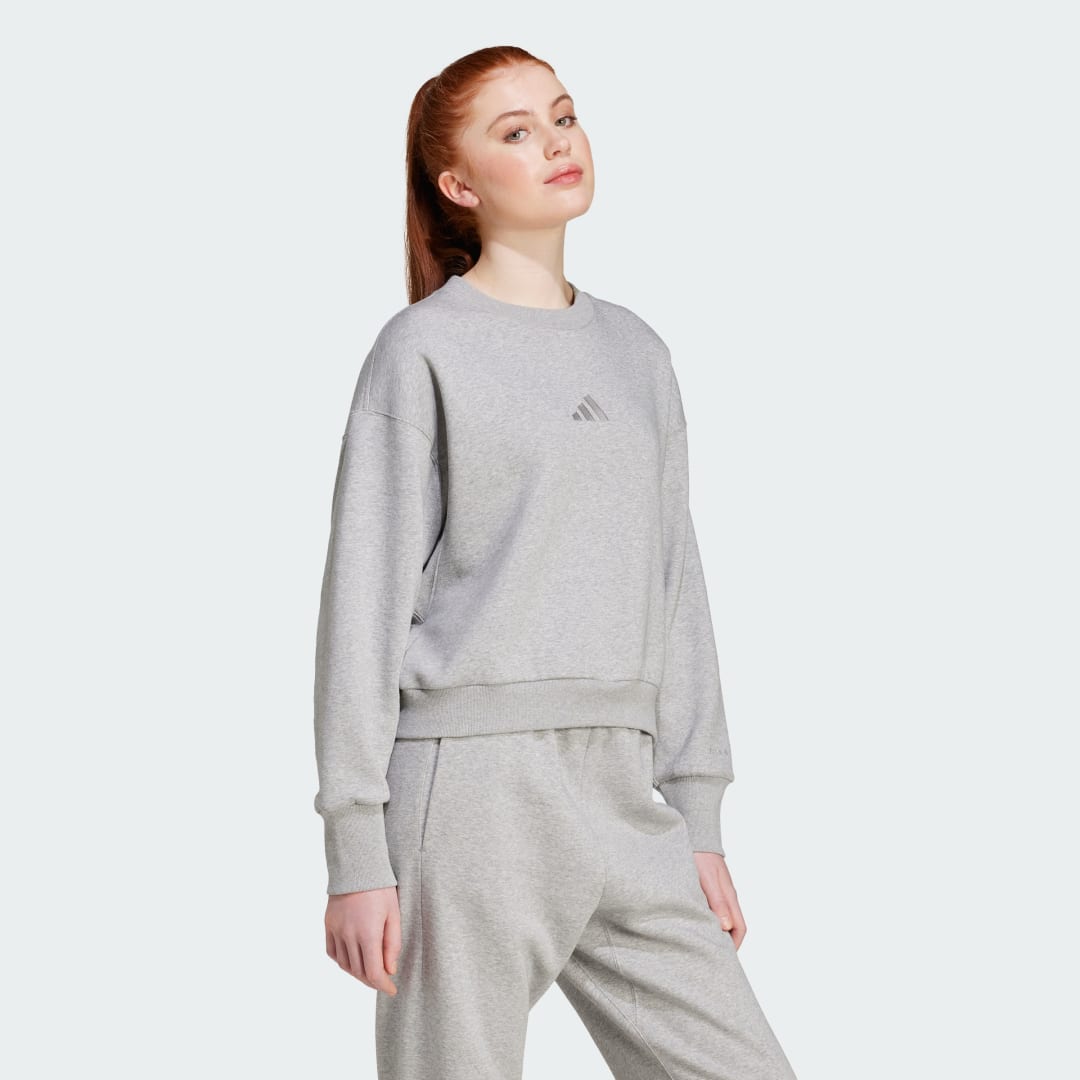 Detalle de Sudadera Adidas ALL SZN Fleece Loose gris: comodidad de estilo relajado