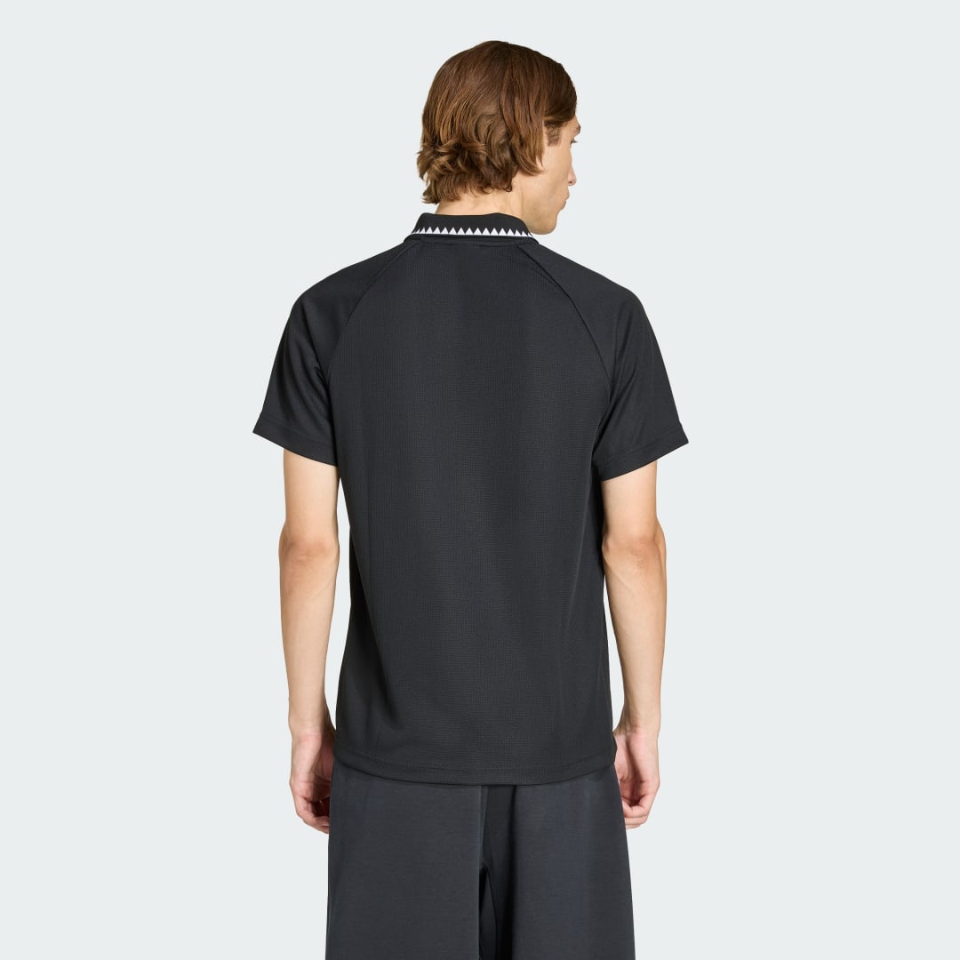 Thumbnail 1 de Polo Chest Stripes Slim de Adidas — polo negro de corte ajustado con detalle de rayas en el pecho
