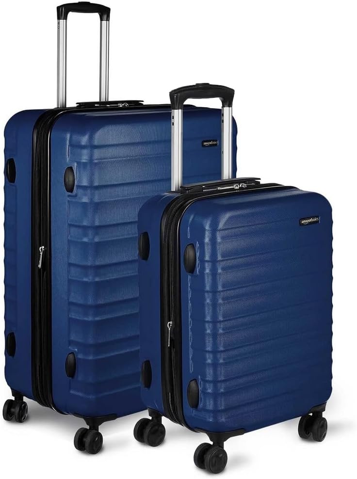 Detalle de Amazon Basics Set Valigie Rigide (Piccola + Grande) in ABS Blu Navy – Espandibili e con 4 Ruote Doppie