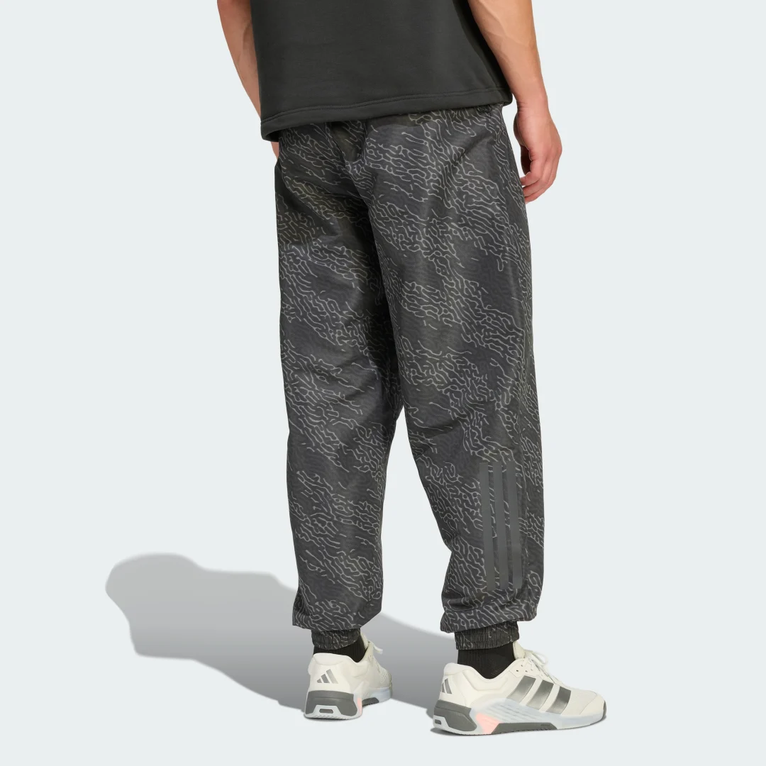 Thumbnail 1 de Adidas PrimeLift AOP pantalón entrenamiento gris