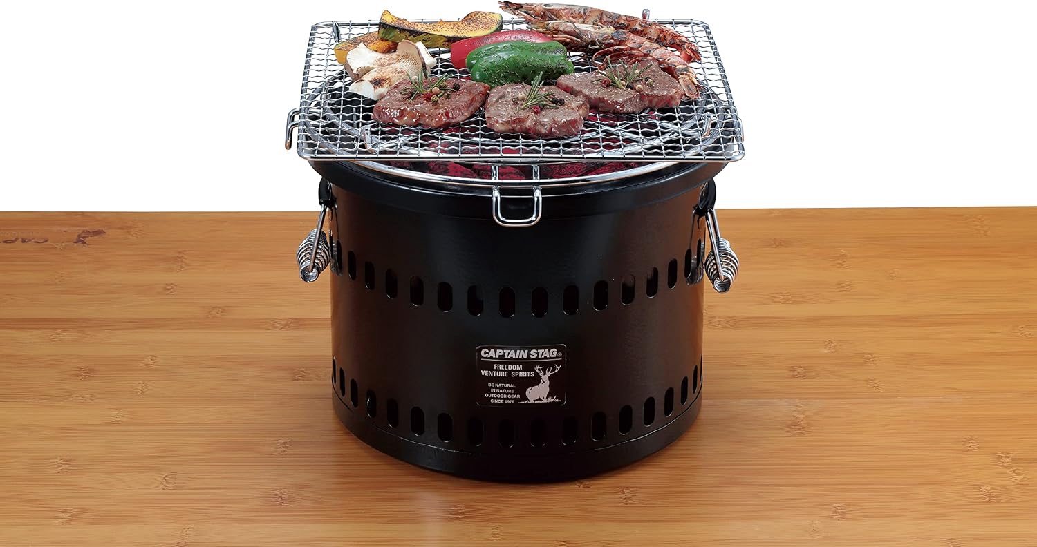 Detalle de キャプテンスタッグ 万能七輪 ポータブル水冷式 炭火焼き用