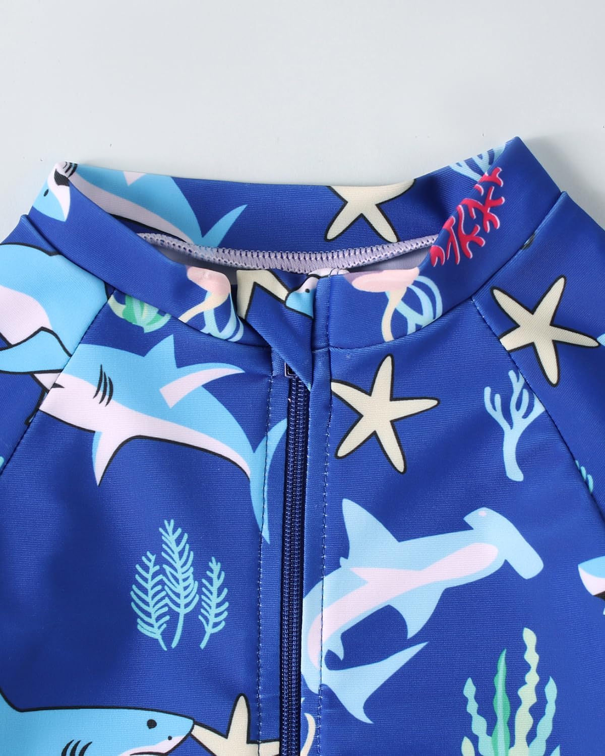 Thumbnail 5 de JiAmy Baby Badeanzug Einteiler kurzarm mit UV-Schutz und Mütze (3 Monate–3 Jahre)