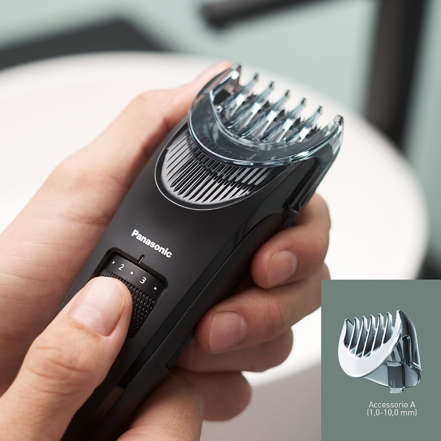 Detalle de Panasonic ER-SC40-K803 Tagliacapelli uomo cordless e con filo impermeabile IPX7, 20 lunghezze 0,5–10 mm