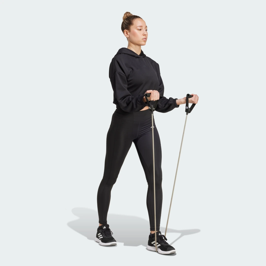 Detalle de Chaqueta de yoga Adidas, color negro — comodidad para tus sesiones