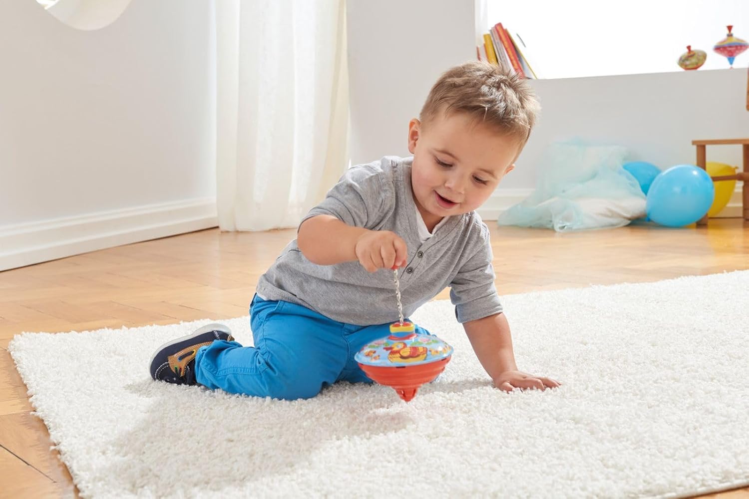 Detalle 1 de LENA tin toys 52410 bromtol met eendjes, metalen tol met handgreep
