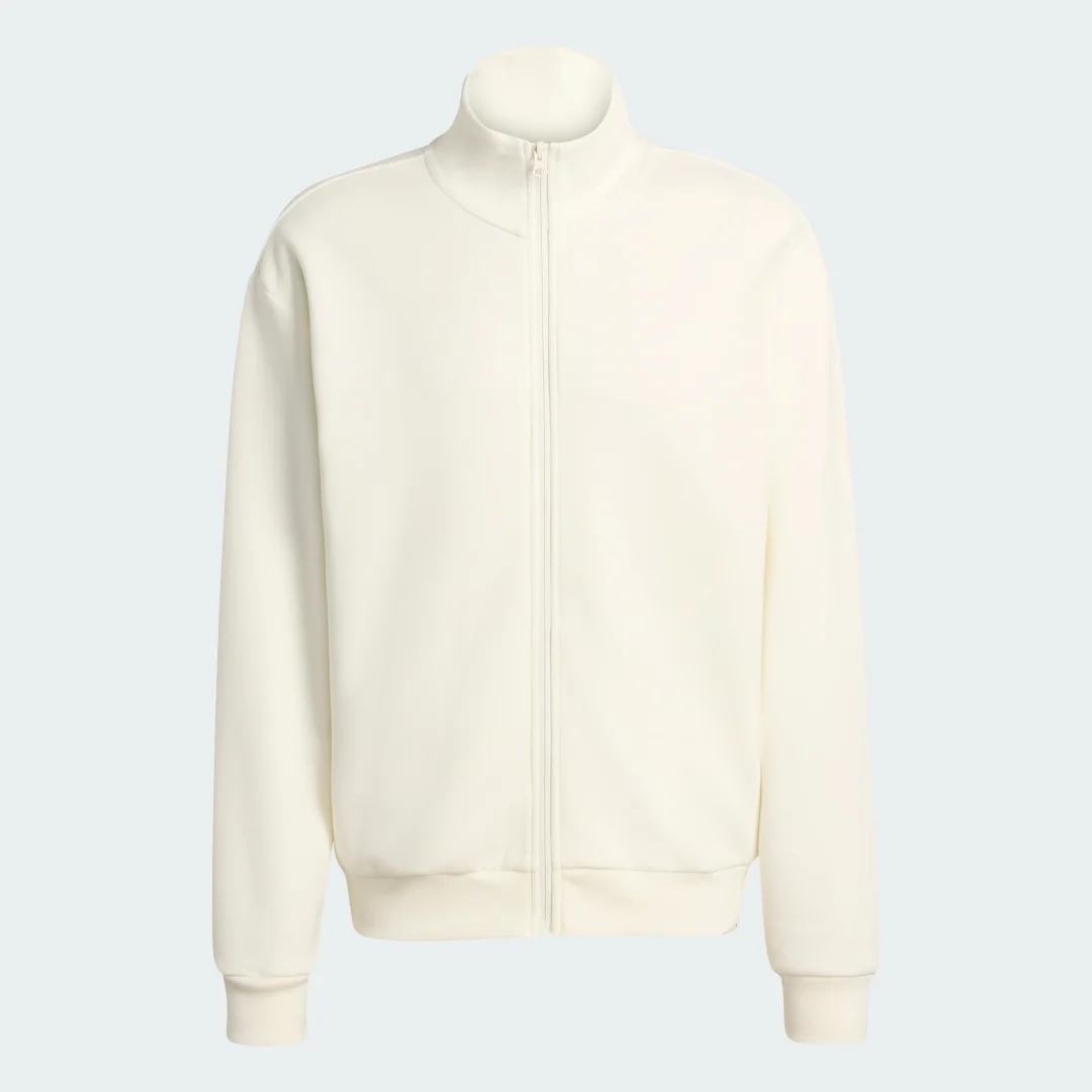 Detalle de Chaqueta deportiva Soft Lux de Adidas: comodidad en blanco para entrenamiento diario