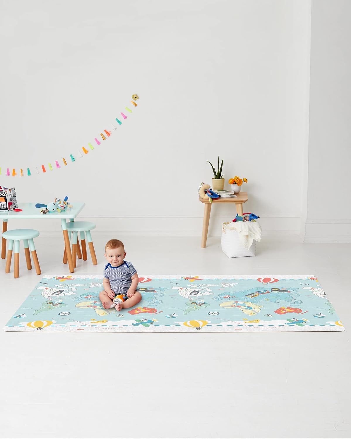 Detalle de Skip Hop Little Travellers omkeerbare speelmat, grijs, oprolbaar en waterdicht