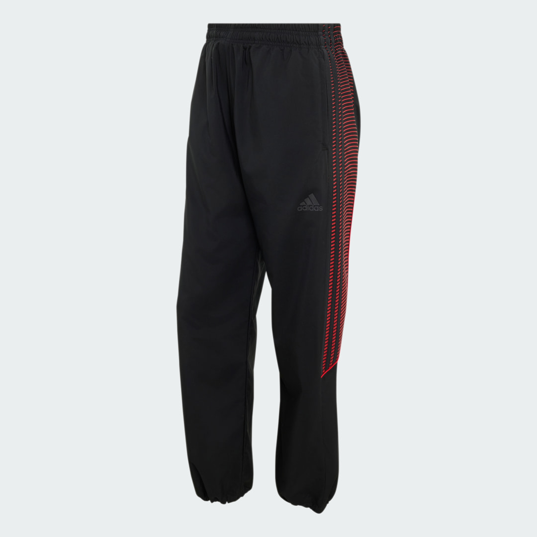 Detalle de Pantalón de chándal adidas x Coca-Cola Teamgeist 26: estilo y comodidad en negro
