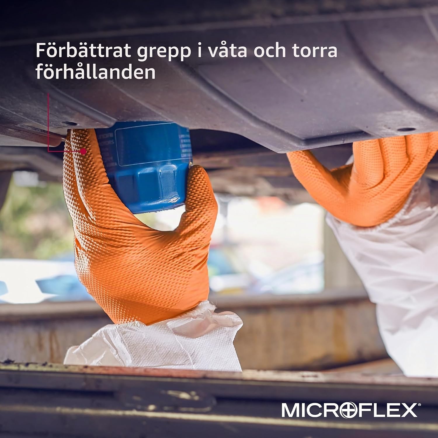Detalle de Ansell MicroFlex 93-256 nitrilhandskar, puderfria och orange, storlek L