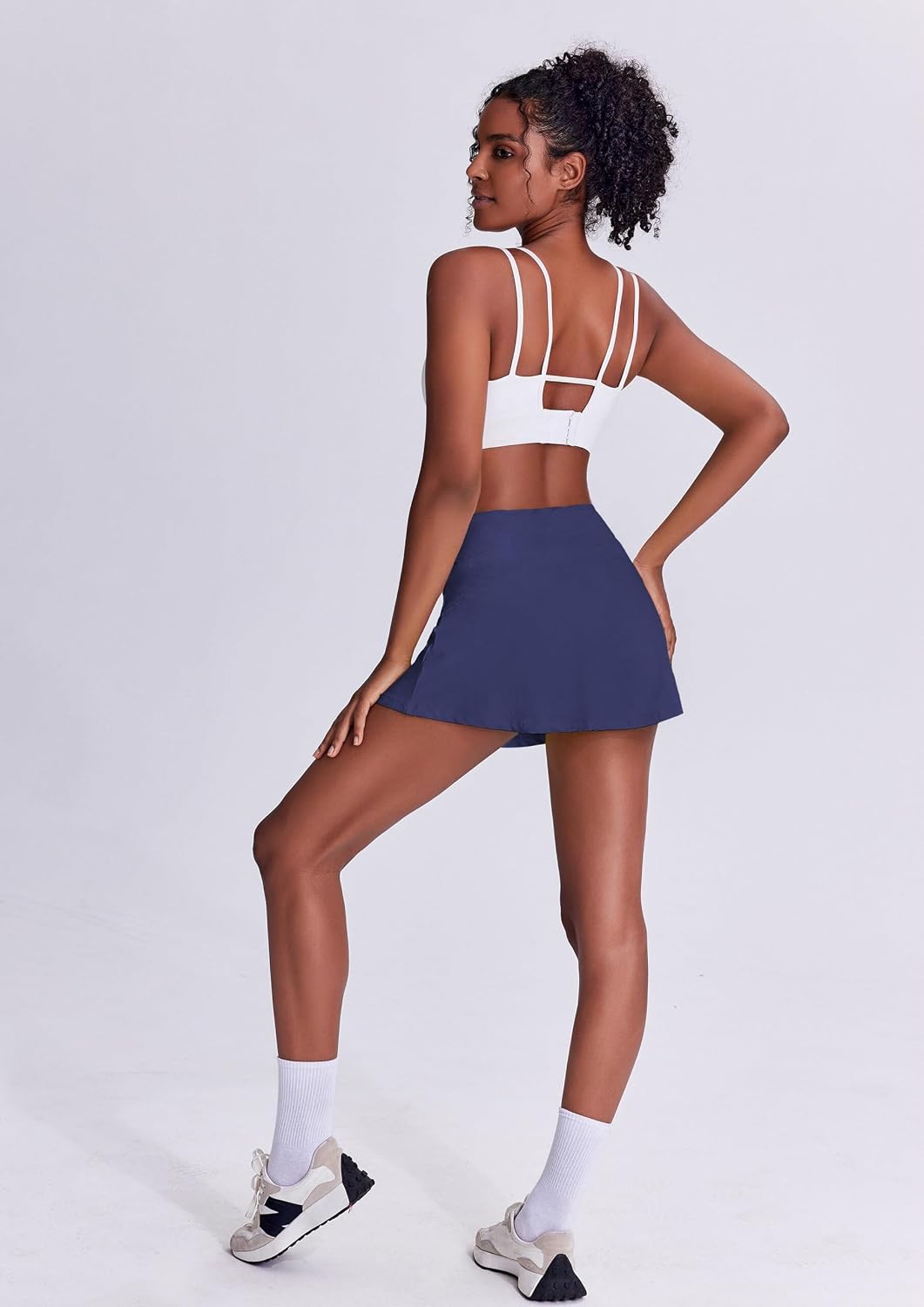 Detalle de PINSPARK Jupe de tennis femme double couche, taille haute plissée avec short intérieur et poches