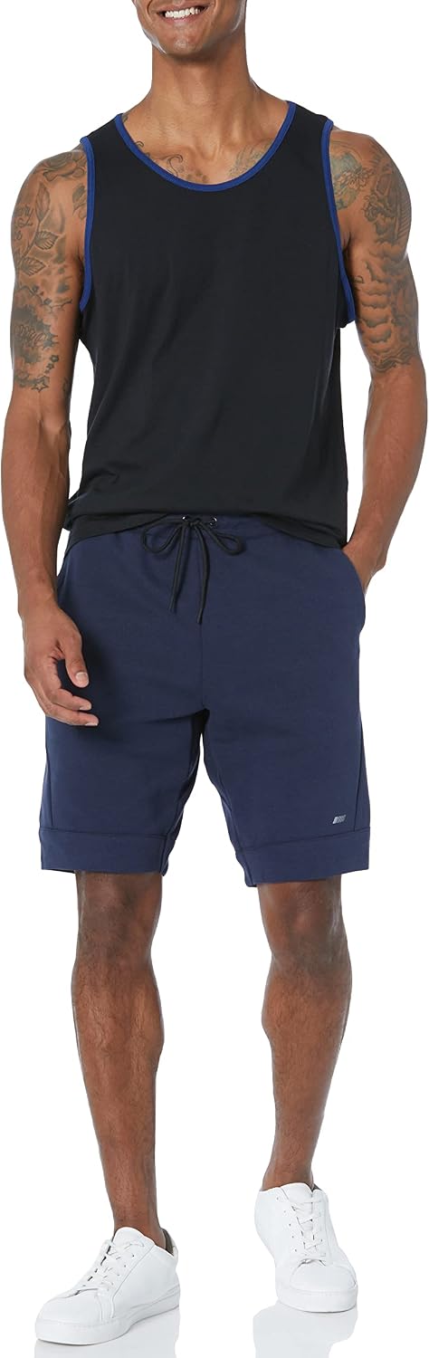 Detalle de Amazon Essentials Herren Tanktop, Normale Passform – Bequemes Basic für heiße Tage