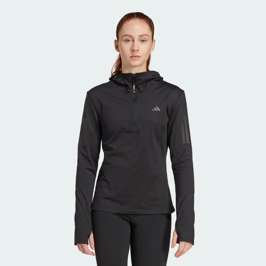 Detalle de Sudadera de invierno con capucha y cremallera hasta el pecho Own The Run de Adidas