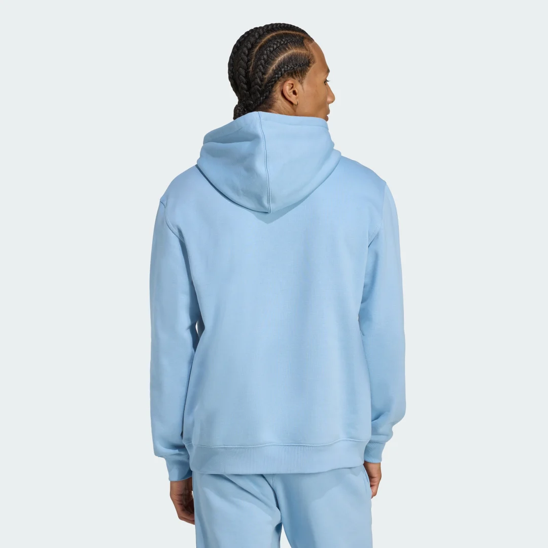 Detalle 2 de Sudadera holgada con capucha Trefoil Essentials de Adidas – azul