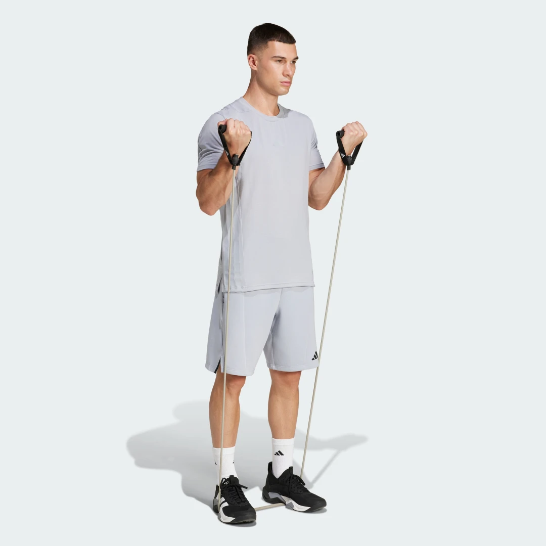 Detalle de Pantalón corto Designed for Training Knit de Adidas (gris)