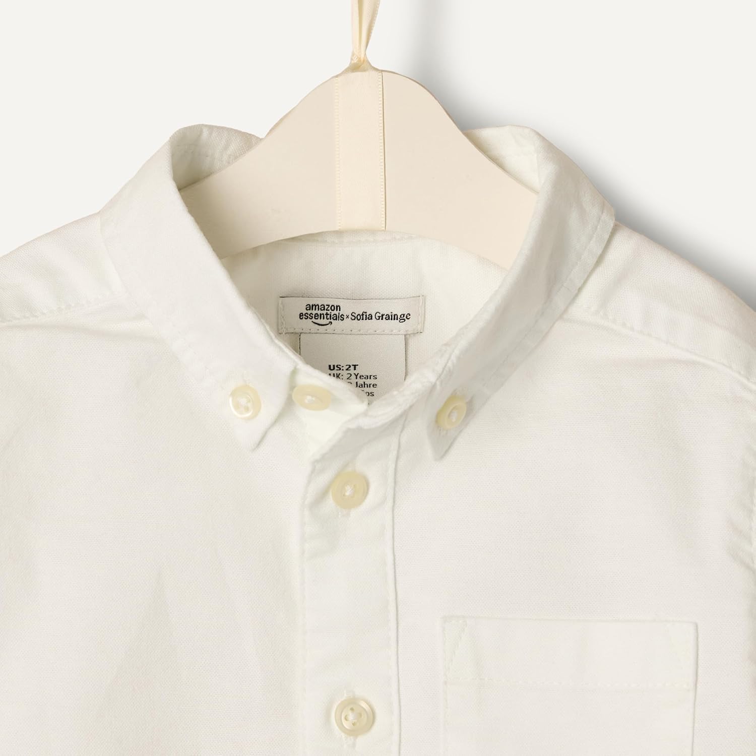 Detalle de Amazon Essentials x Sofia Grainge Toddler and Baby Boys' Stretch Oxford Collar Shirt