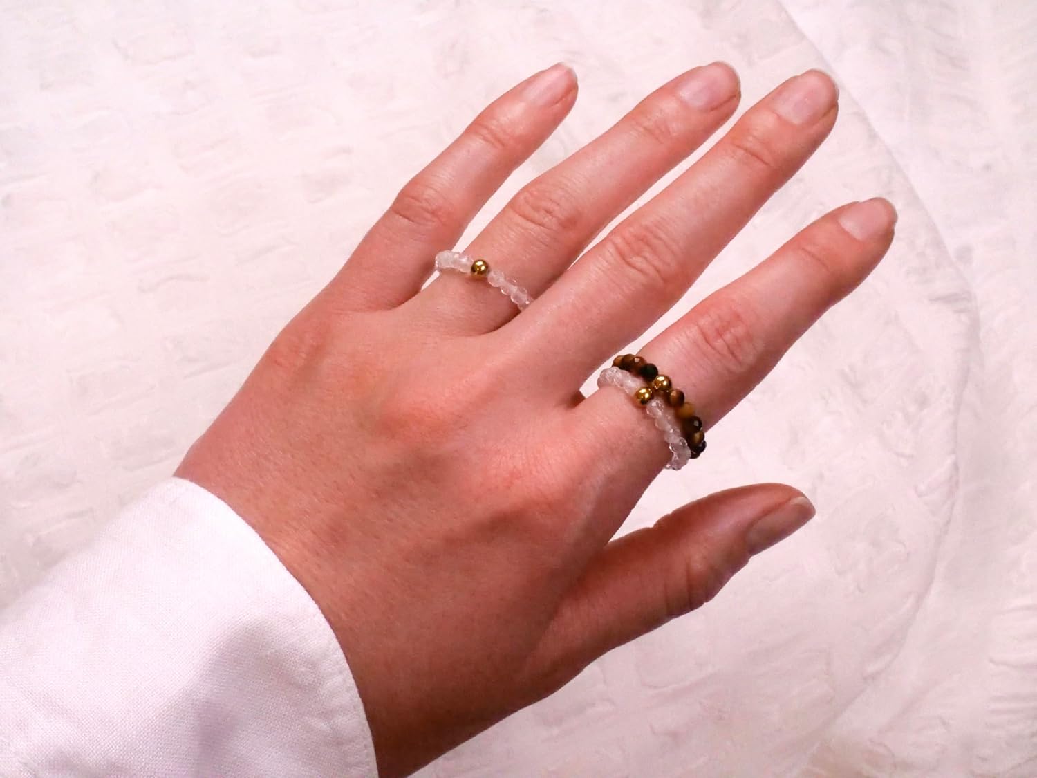 Detalle 2 de BERGERLIN Echter Naturstein Perlen Ring – Unisex Bergkristallring mit vergoldeter Perle, EPI‑Zertifikat