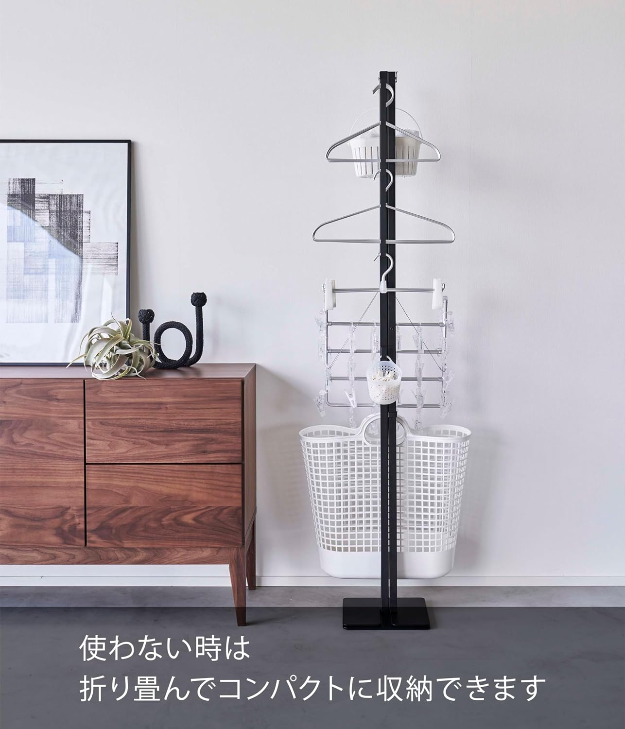 Detalle de 山崎実業 tower 6620 折り畳み室内物干し ブラック 幅175cm・コンパクト収納