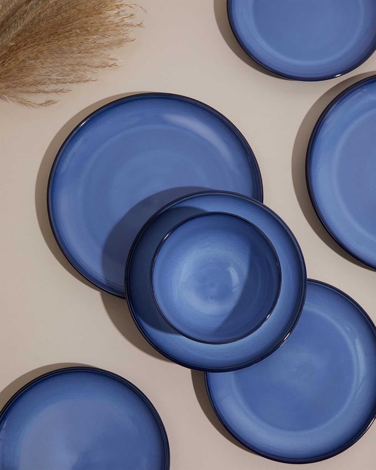 Detalle 2 de Pokini Blue Stoneware Dinnerware Set, 12 pcs — Reactive Glaze Plates & Bowls for 4