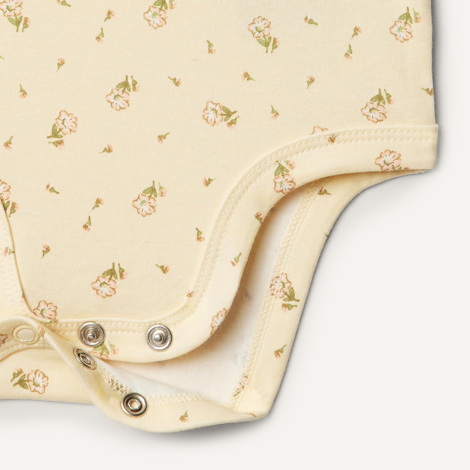 Detalle de Amazon Essentials x Sofia Grainge Body in cotone con volant e ricami - Pack da 2 per bambine e ragazze