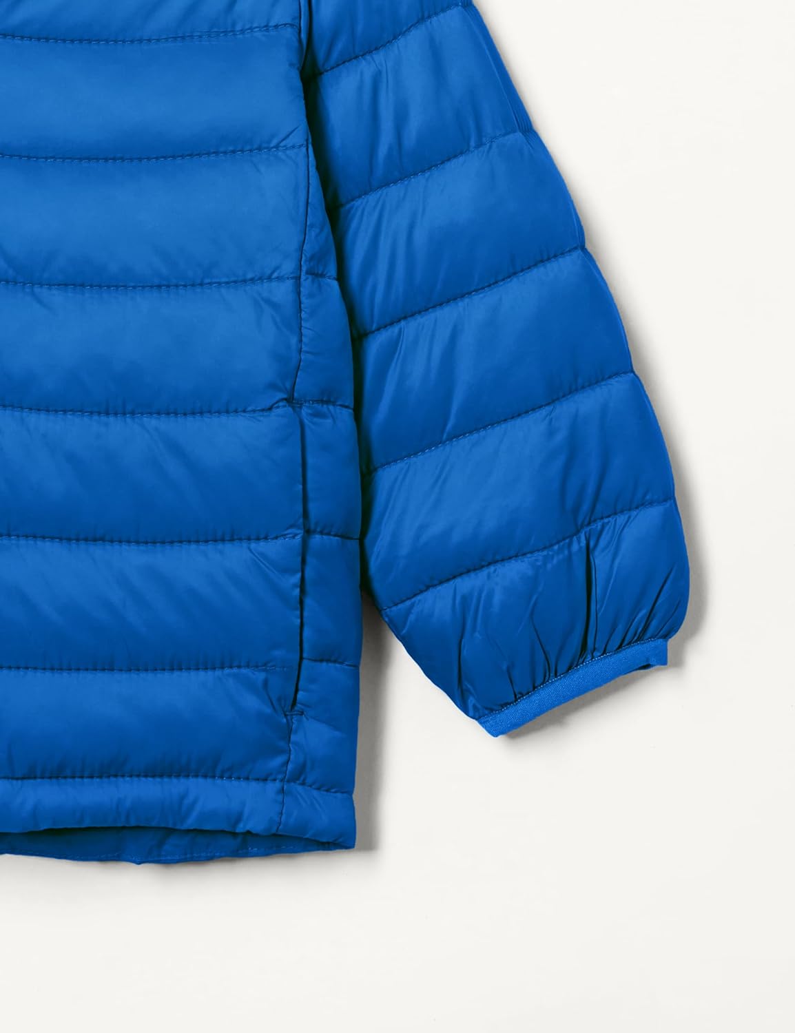 Detalle de Amazon Essentials Jungen Leichte wasserdichte verstaubare Übergangsjacke mit Kapuze