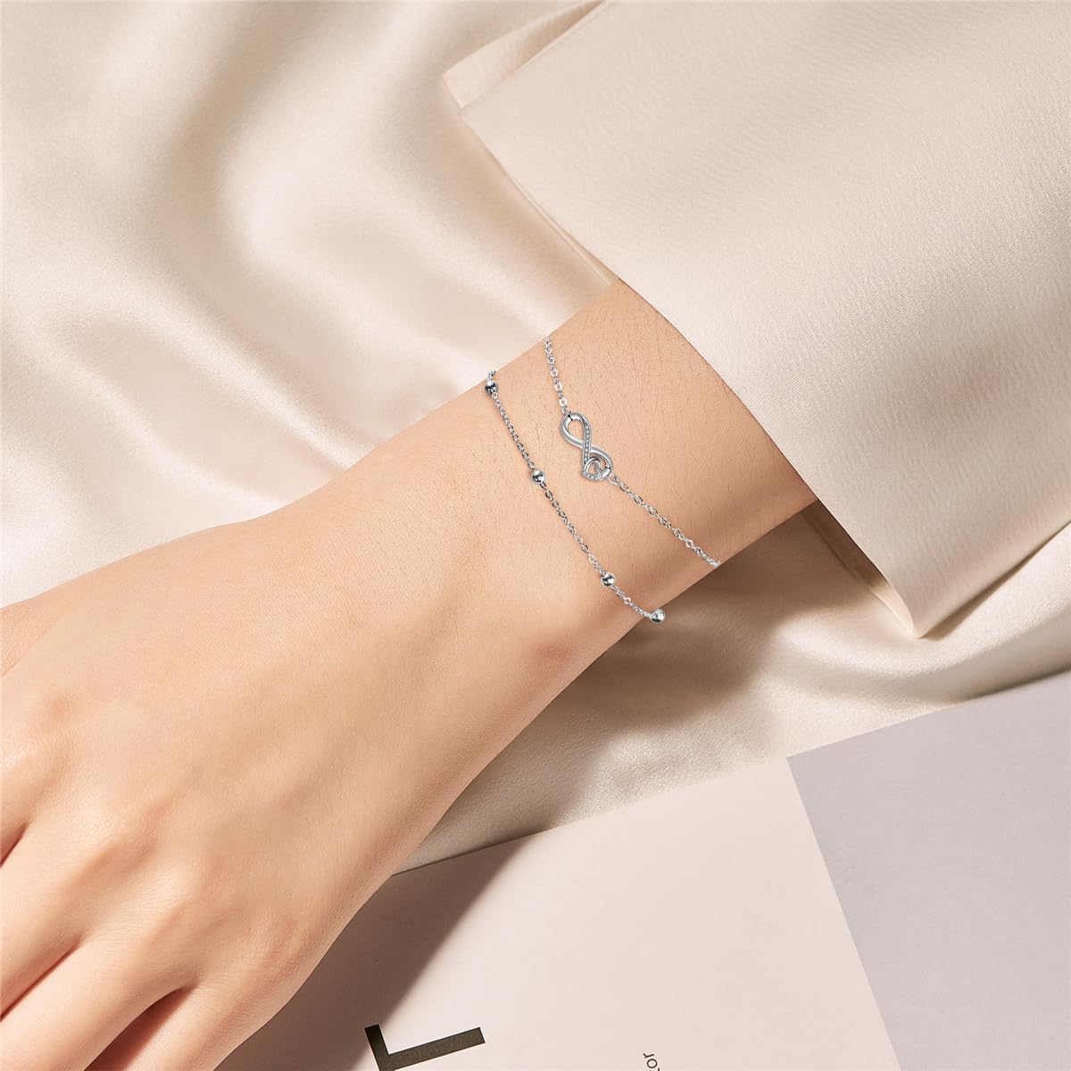 Detalle de J.MUEN Damen-Armband aus 925 Sterling Silber (unendliches Motiv mit Zirkonia), verstellbar für Muttertag & Geburtstag