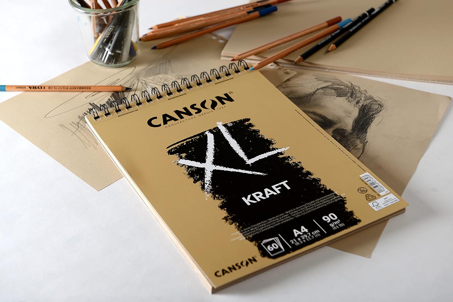 Thumbnail 1 de Canson Bloc 60 feuilles XL kraft rayées spiralé petit côté A4 90 g