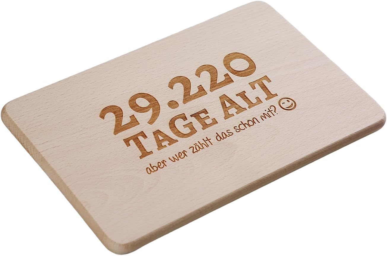 Detalle 2 de Brotzeitbrett zum 70. Geburtstag – Schneidbrett mit Spruch (22 × 14 × 1 cm) aus Buche