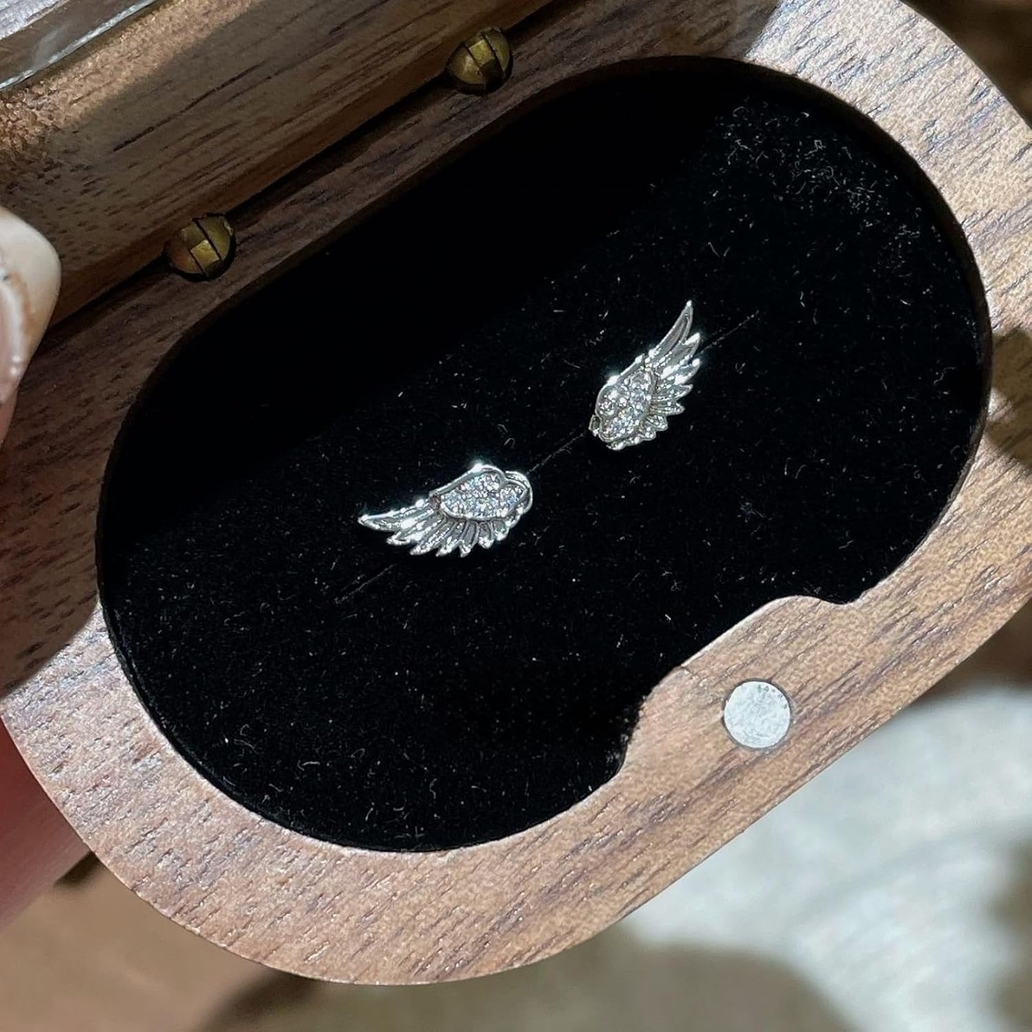Detalle 1 de Angel Wing Stud Earrings in Stainless Steel