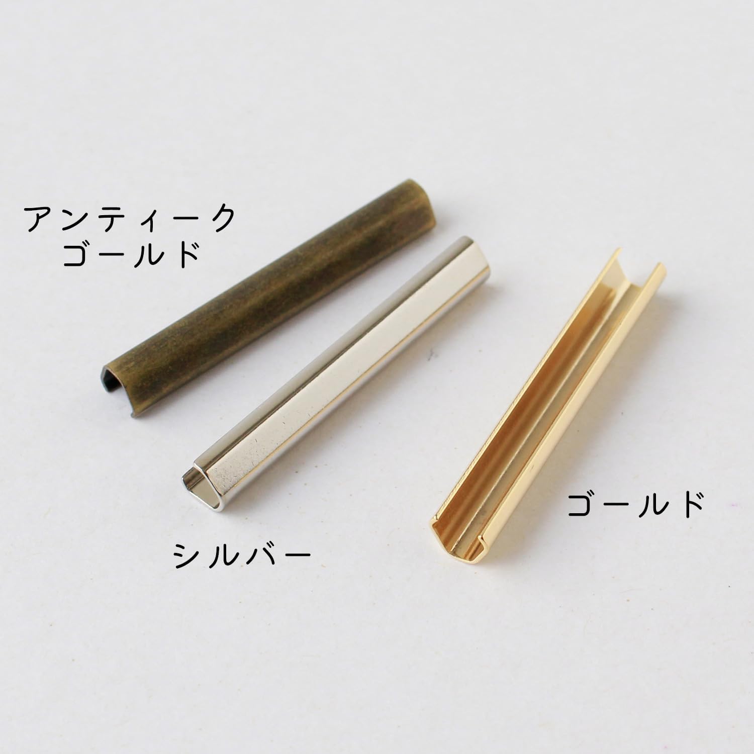 Detalle 2 de 日本紐釦貿易 M193-S ヘリ止金具 真鍮製・シルバー W40×H6mm 10個入