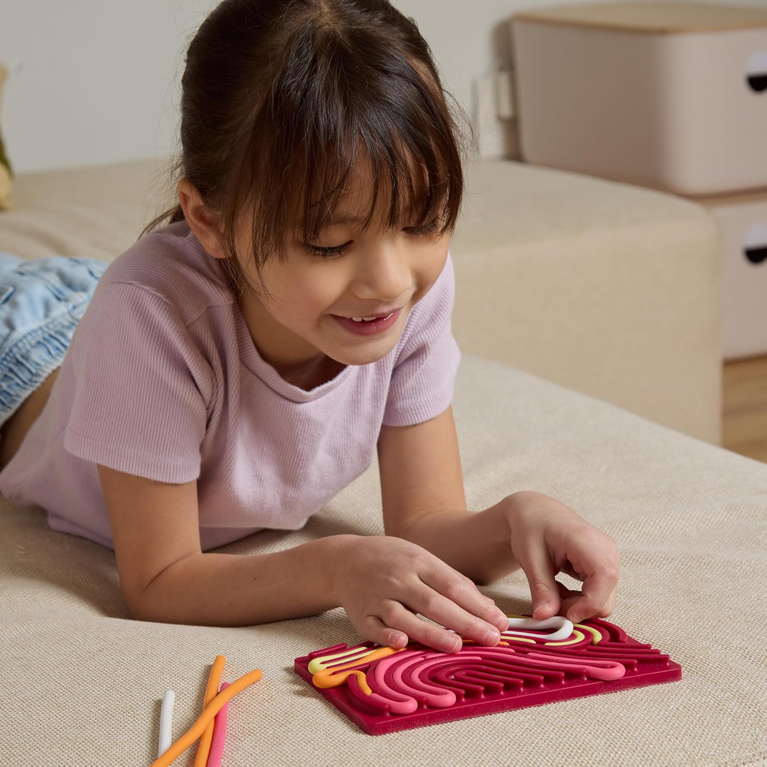 Detalle de Pushpeel PPAB001 Sensory Activity Board, Silicone Fidget Toy with 11 Strings