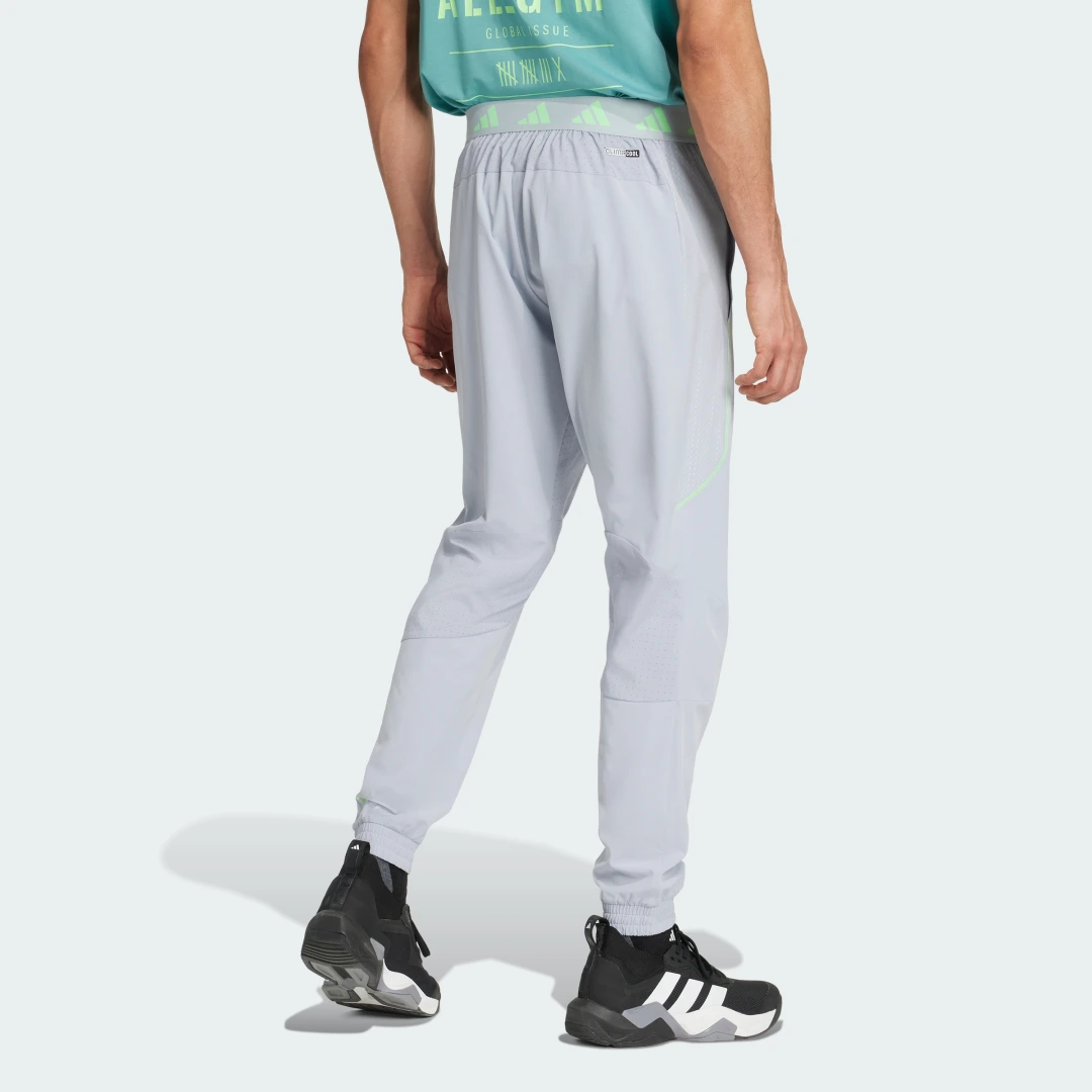 Thumbnail 1 de Pantalón Tech Apparel de Adidas: comodidad y estilo gris para tu día a día
