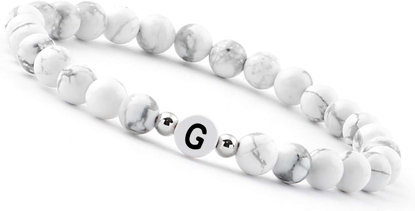 Detalle de Bracelet or 18K avec lettres gravées