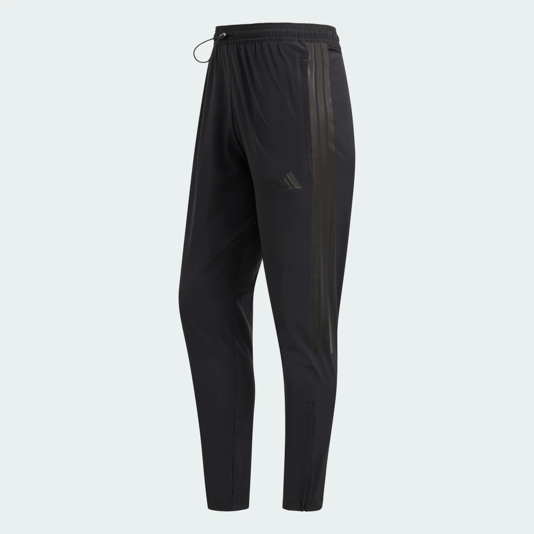 Detalle de PANTALÓN HOUSE OF TIRO de Adidas – versatilidad y estilo en Negro