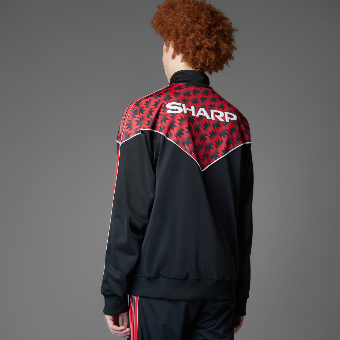 Thumbnail 1 de Chaqueta Manchester United '91 de Adidas — negro, estilo retro para fans y uso urbano