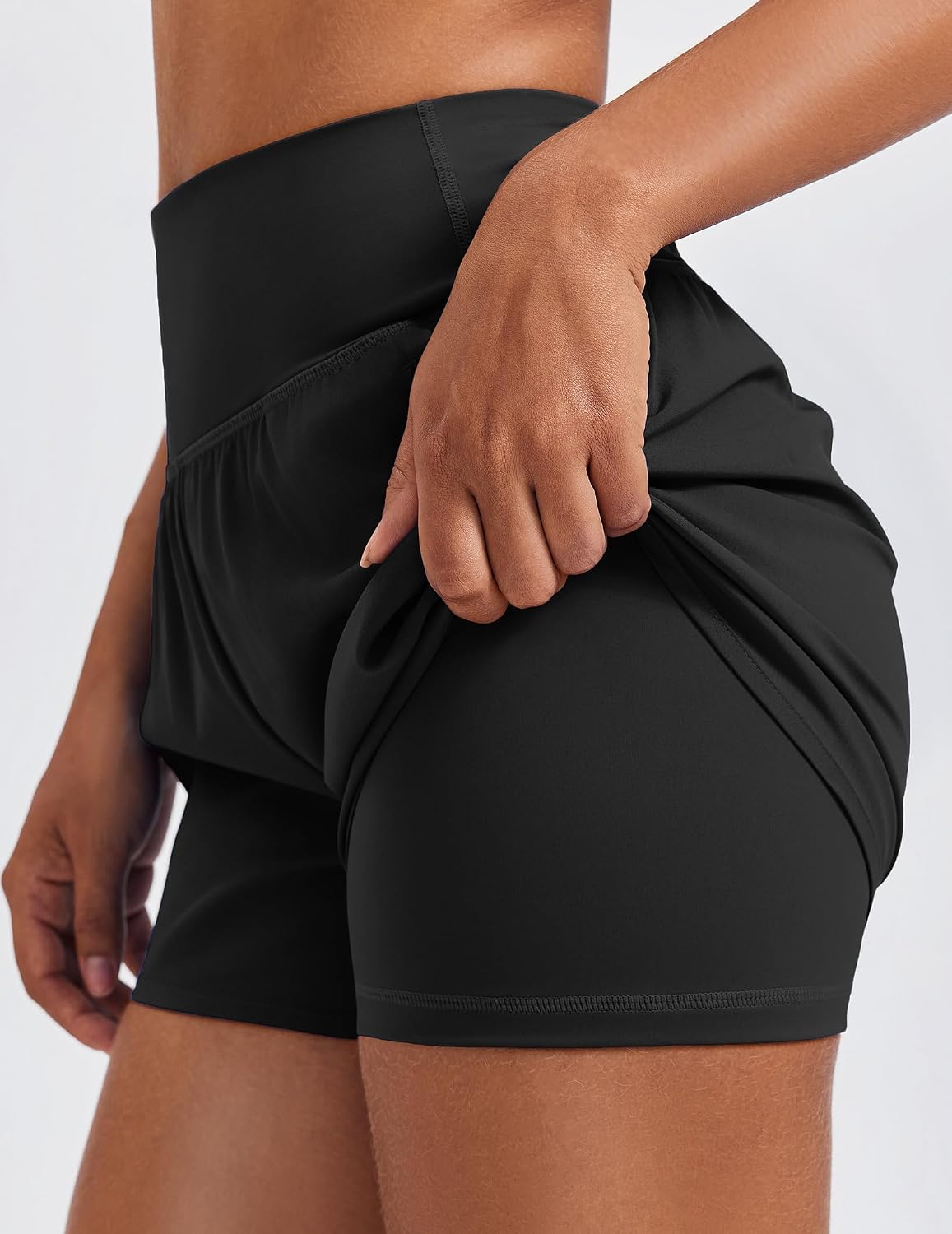 Detalle 2 de PINSPARK Women's 2 in 1 High Waisted Athletic Running Shorts 3" Dolphin Hem