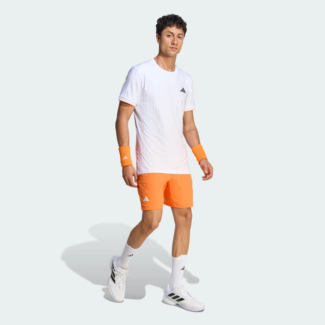 Thumbnail 2 de CONJUNTO PANTALÓN CORTO DE TENIS CON INTERIOR CLIMACOOL de Adidas - color naranja