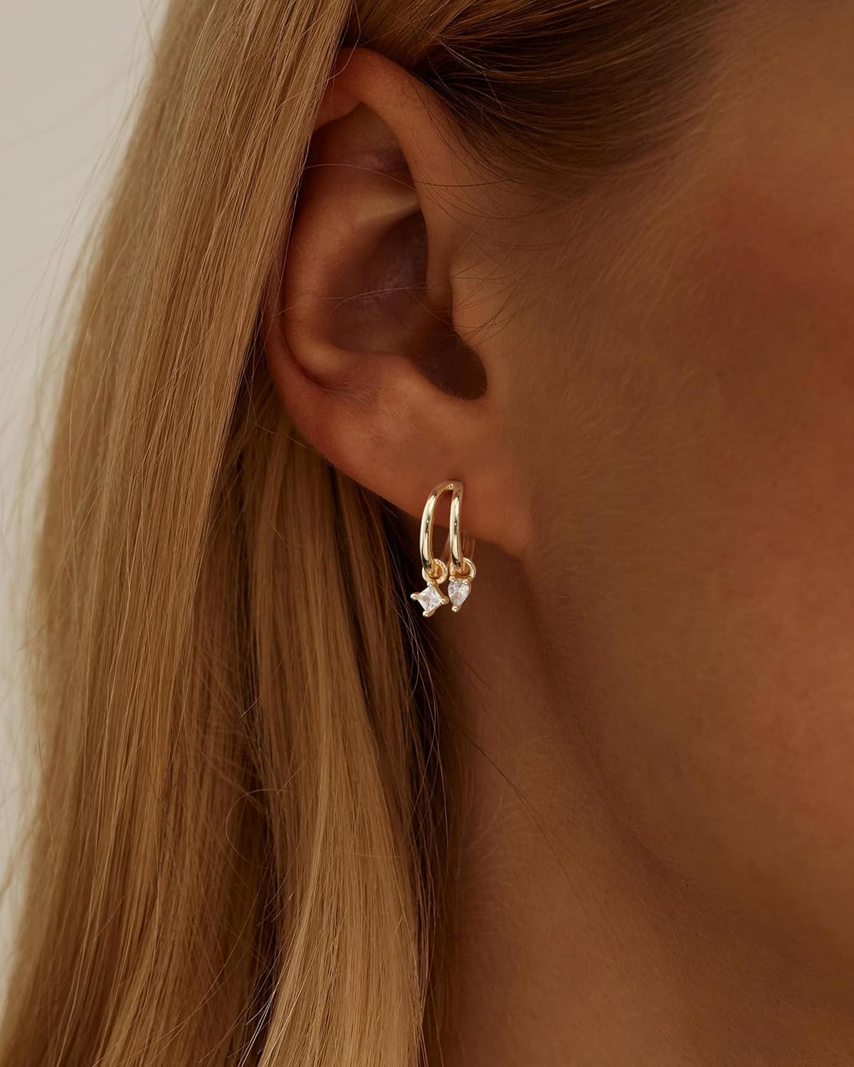 Detalle 2 de HANLI 14K Gold Plated Triple Huggie Hoops: Illusion Cubic Zirconia Studs for Single-Pierced Ears