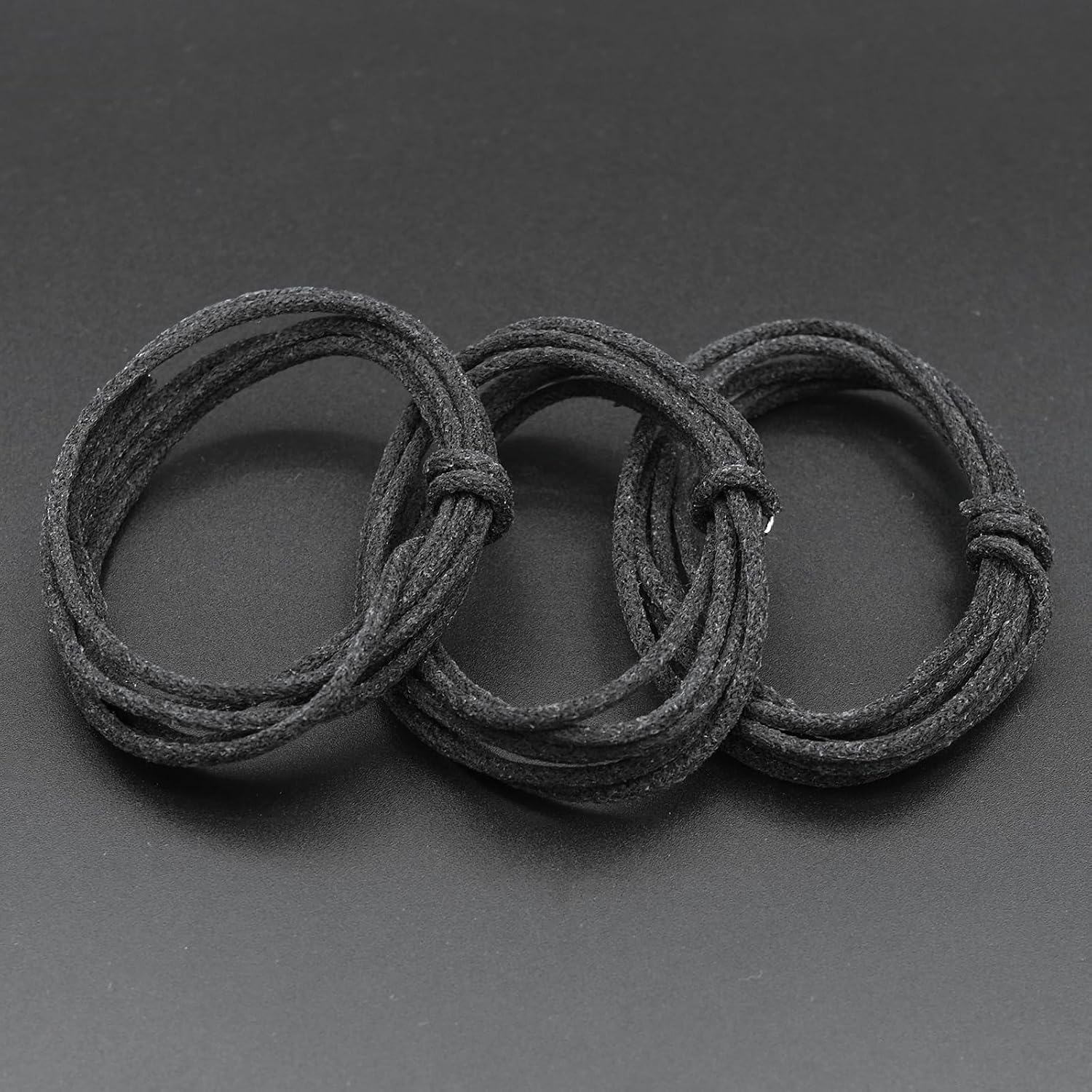 Detalle 1 de Xuxing 023-2 Pushback Guitar Wire, 10 Ft Black Cloth-Covered Design