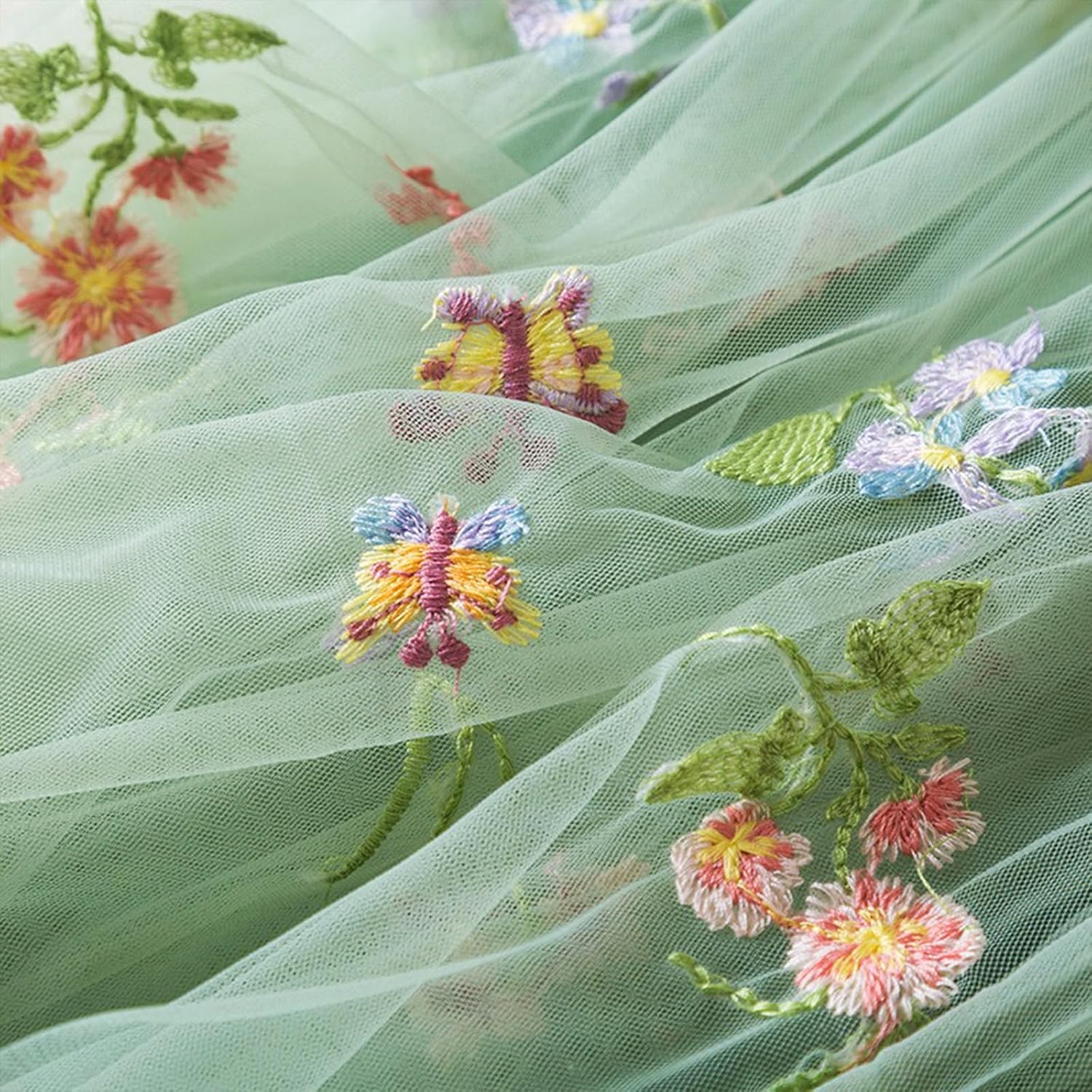 Detalle 1 de DivingBirds mouwloze tulejurk voor babymeisjes met vlinder- en bloemenmotief
