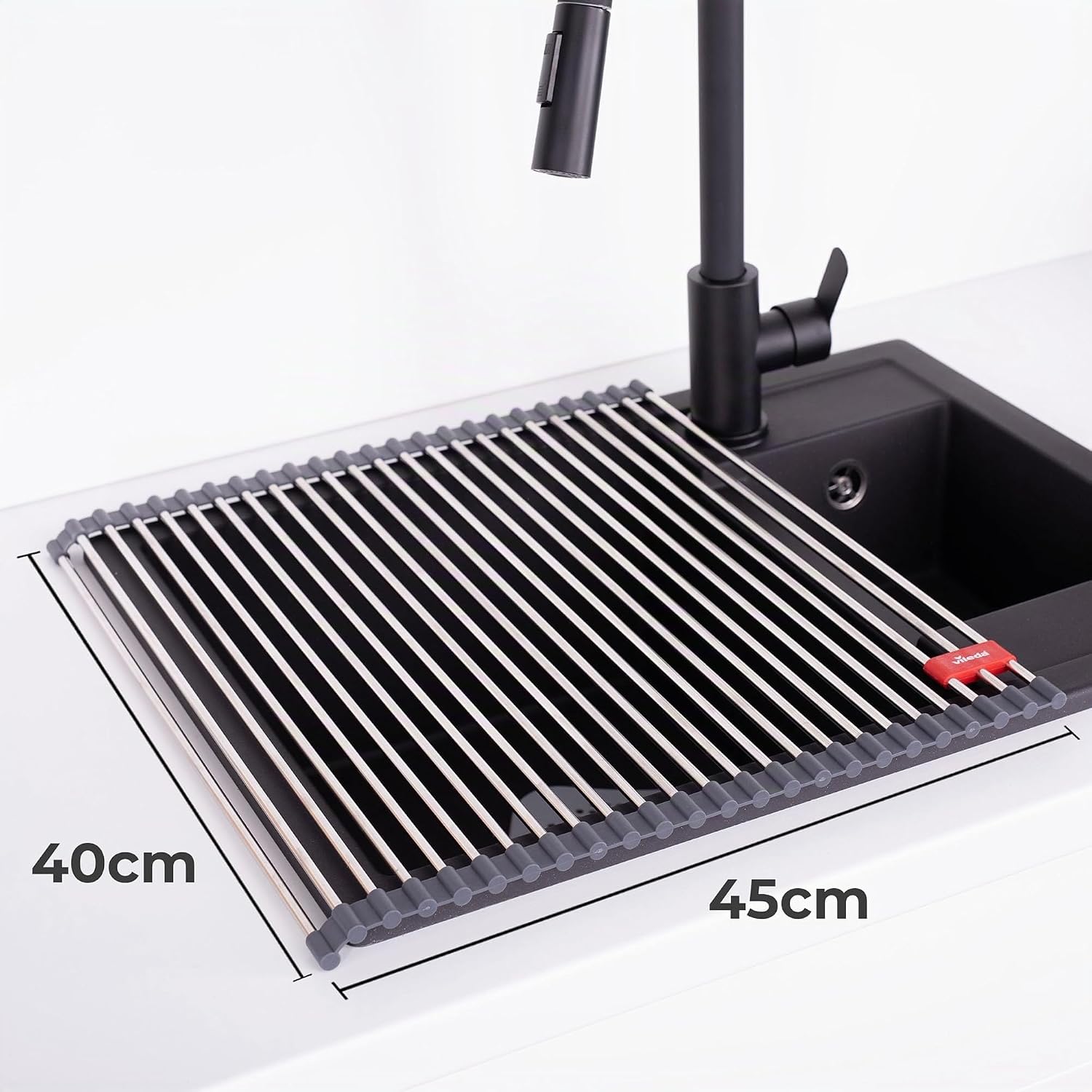 Detalle de Scolapiatti arrotolabile per lavello 45x40 cm in acciaio inox e TPE – 24 aste, pieghevole