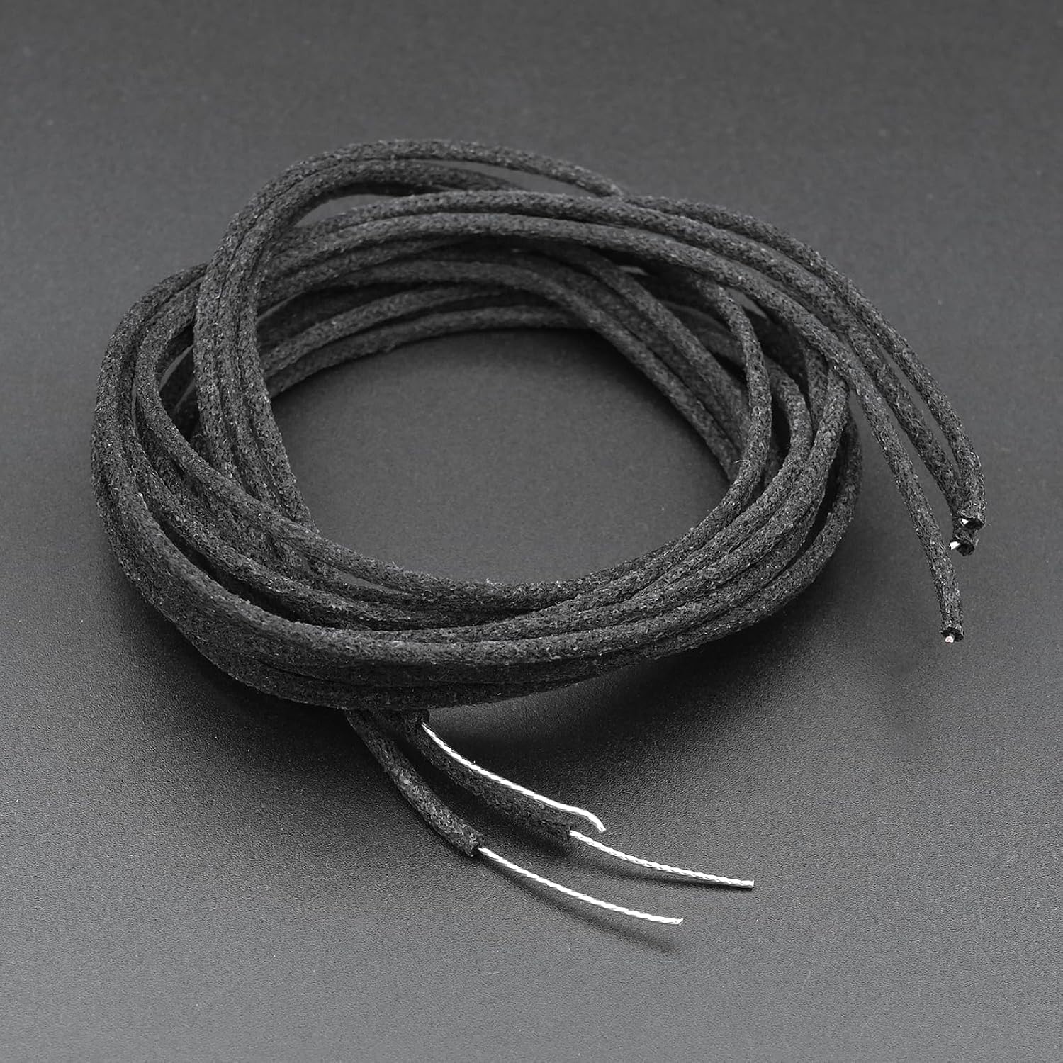 Detalle 2 de Xuxing 023-2 Pushback Guitar Wire, 10 Ft Black Cloth-Covered Design
