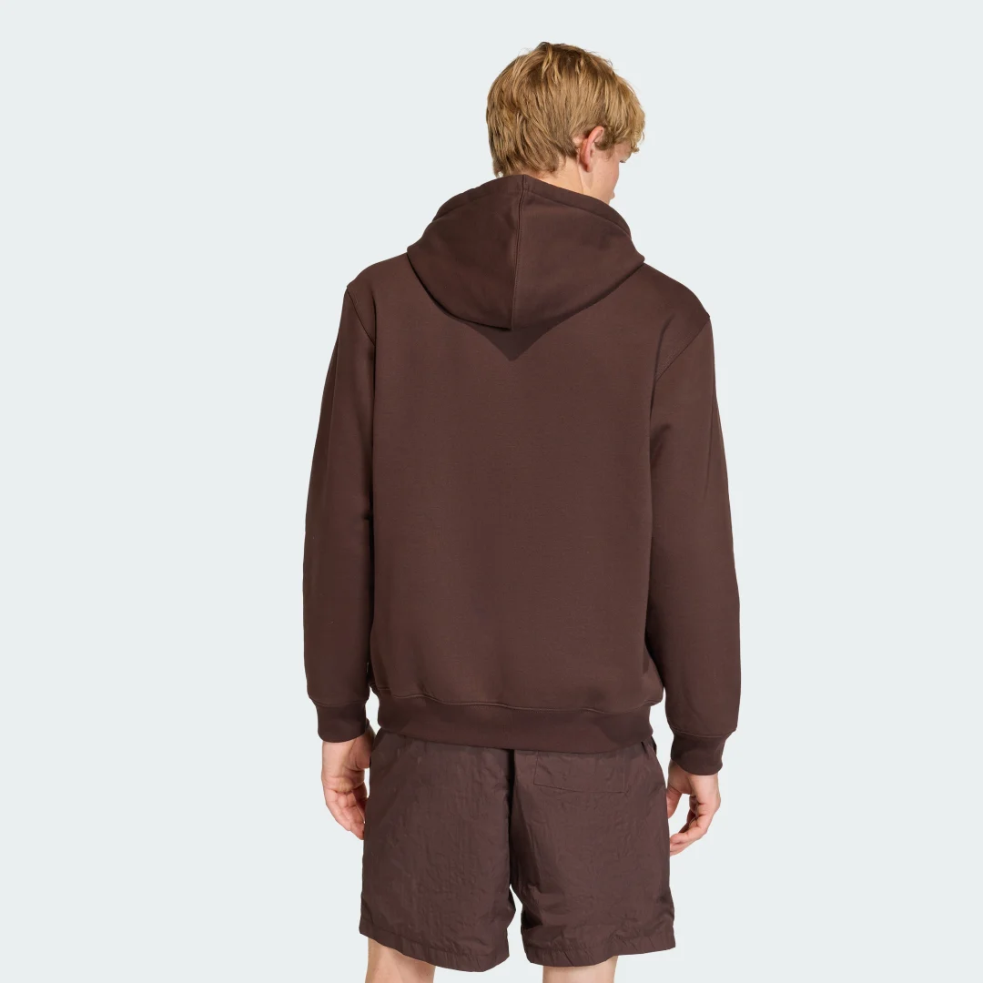 Detalle 2 de Sudadera holgada con capucha Trefoil Essentials de Adidas